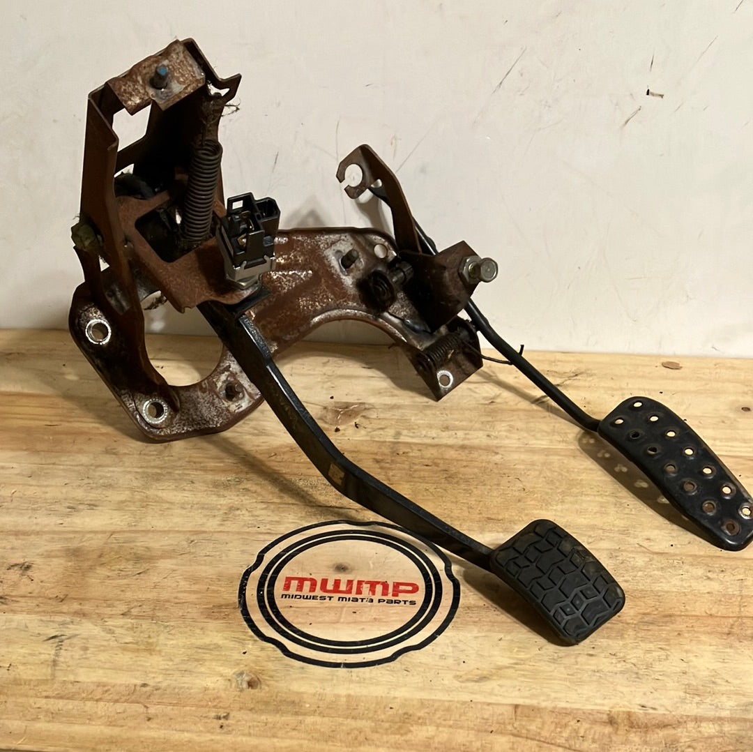 brake pedal and gas pedal 1990-2005 Mazda Miata Manual Gas and Brake Pedal Assembly NA01-43-030 –  Midwest Miata Parts